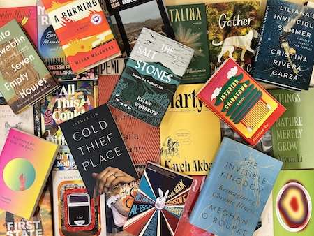 colorful books arrayed on a table